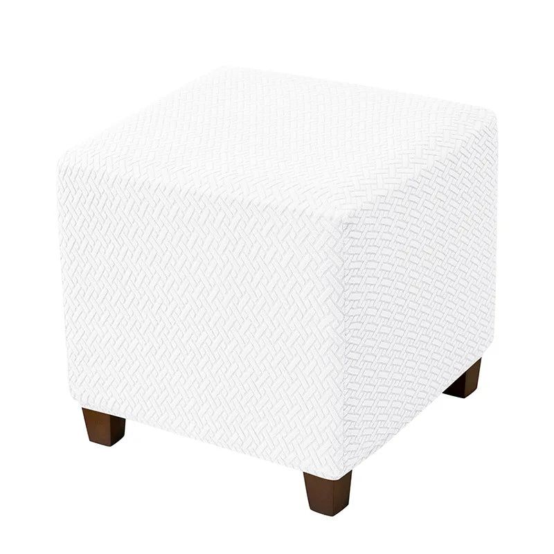 White stretch jacquard ottoman slipcover with an elastic edge