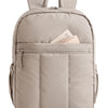 A light beige laptop backpack with padded straps and a zippered compartment for a laptop.