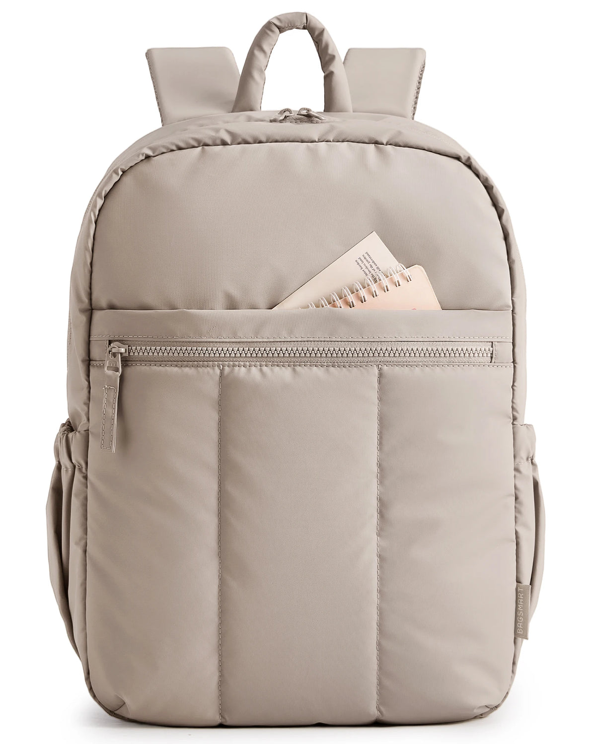 A light beige laptop backpack with padded straps and a zippered compartment for a laptop.