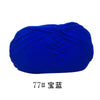 A ball of bright blue soft 4-ply milk cotton yarn for knitting and crochet.