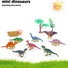 A set of eight mini dinosaur figurines, including a T-Rex and various other dinosaurs, displayed on green grass.