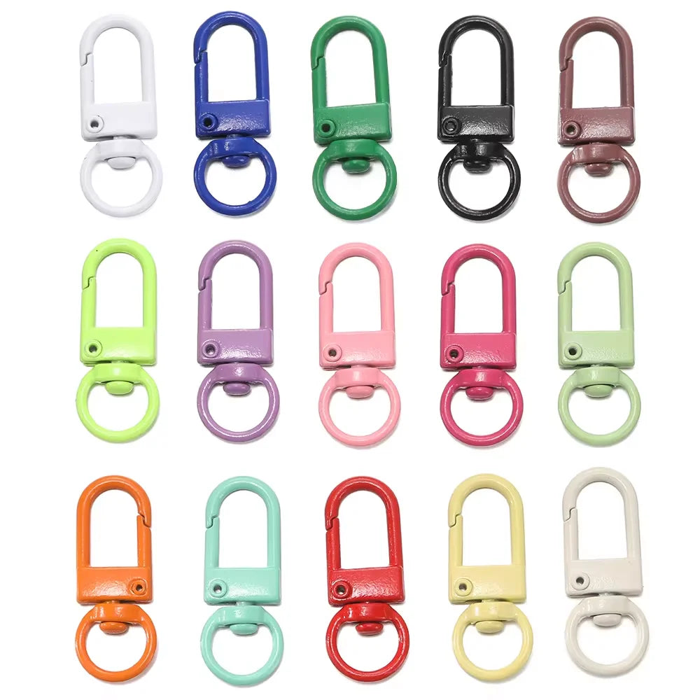A collection of colorful alloy lobster clasp hooks for DIY jewelry making in various shades of green, purple, pink, and yello