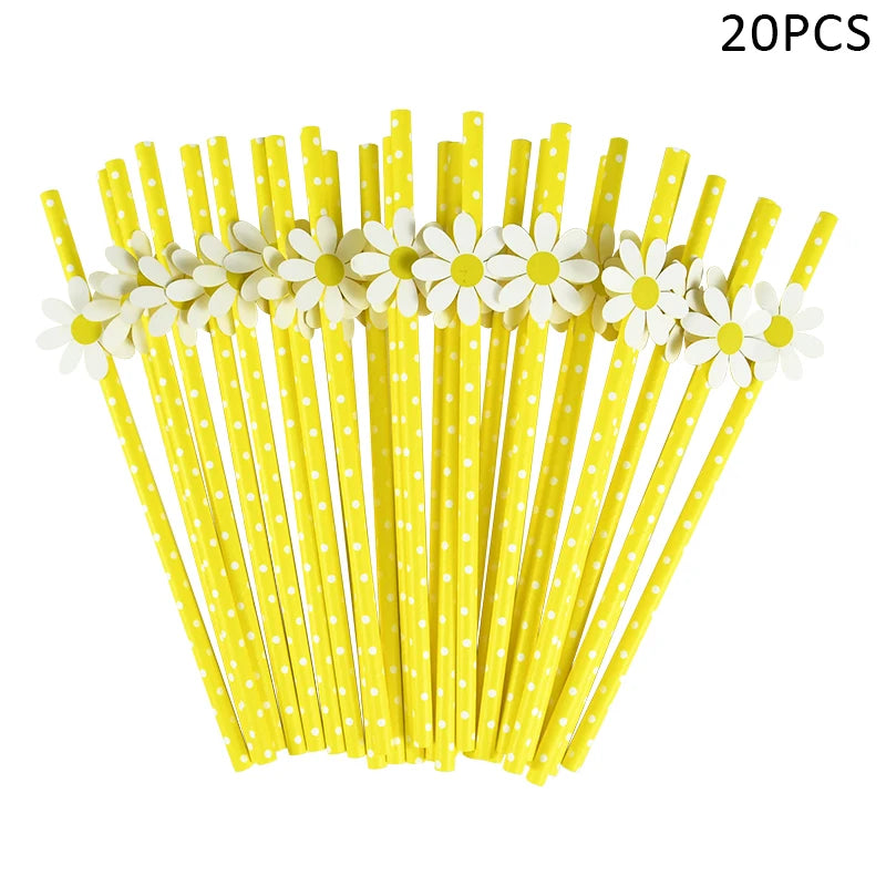 A set of 20 yellow disposable plastic straws decorated with white daisy flowers for party tableware.