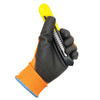 A hand wearing a black work glove is holding a yellow tool with serrated edges.