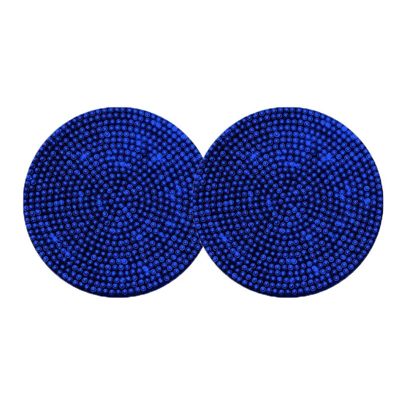 A set of two blue non-slip diamond car cup holder coasters.