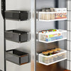 A silver magnetic refrigerator storage rack with multiple clear and black mesh bins for organizing food items.
