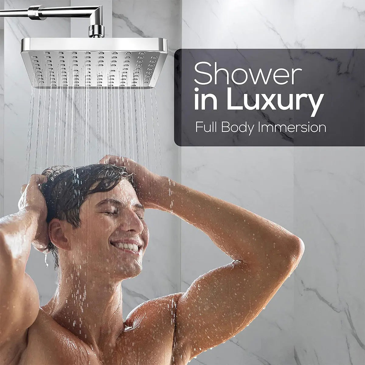 A man is enjoying a shower from a 6-inch high-pressure rainfall shower head in a luxurious bathroom setting.