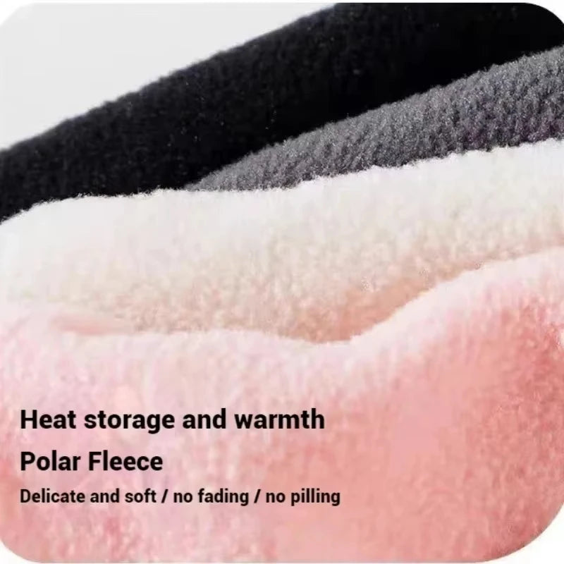 Three layers of polar fleece in black, gray, and pink showing heat storage and warmth.
