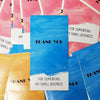 Eine Sammlung rechteckiger Dankesversiegelungsaufkleber in Rosa-, Orange- und Blautönen.