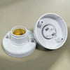 A white E27 screw cap light bulb holder with a brass socket and mounting posts.