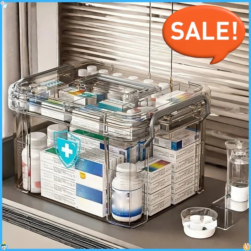 A transparent plastic first aid storage box with a handle filled with various medical supplies and documents.