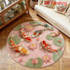 Round plush rug with a pink background featuring colorful koi fish and green leaves