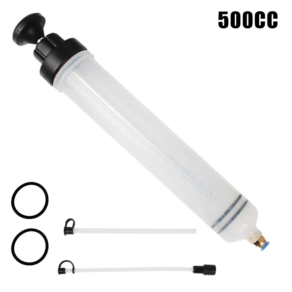 A clear syringe with a black plunger and various clear tubes for manual fuel transfer or oil extraction.