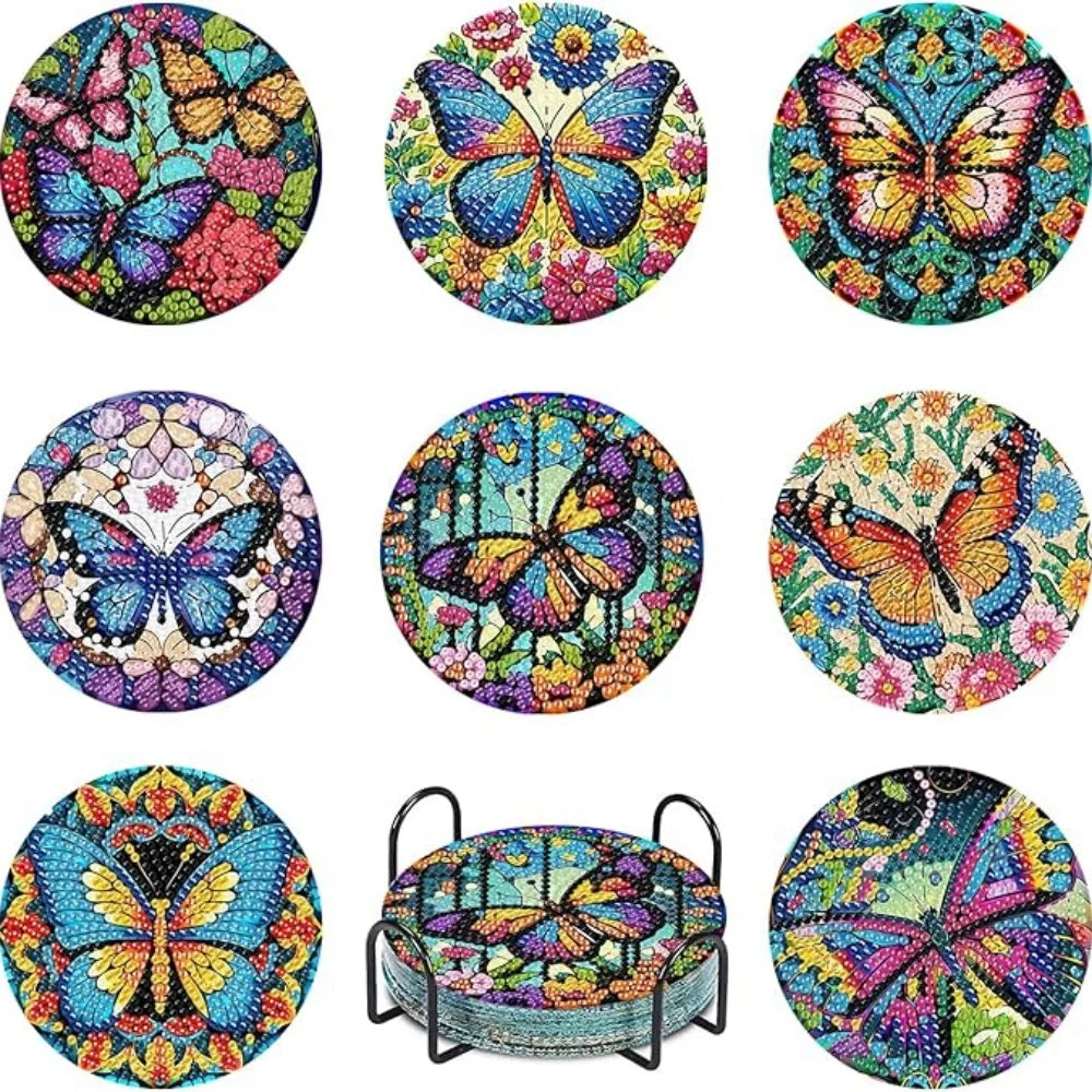 A collection of eight colorful butterfly-themed diamond art coasters and a holder kit.