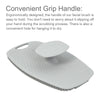 A white silicone body scrubber and massage brush with a convenient grip handle.