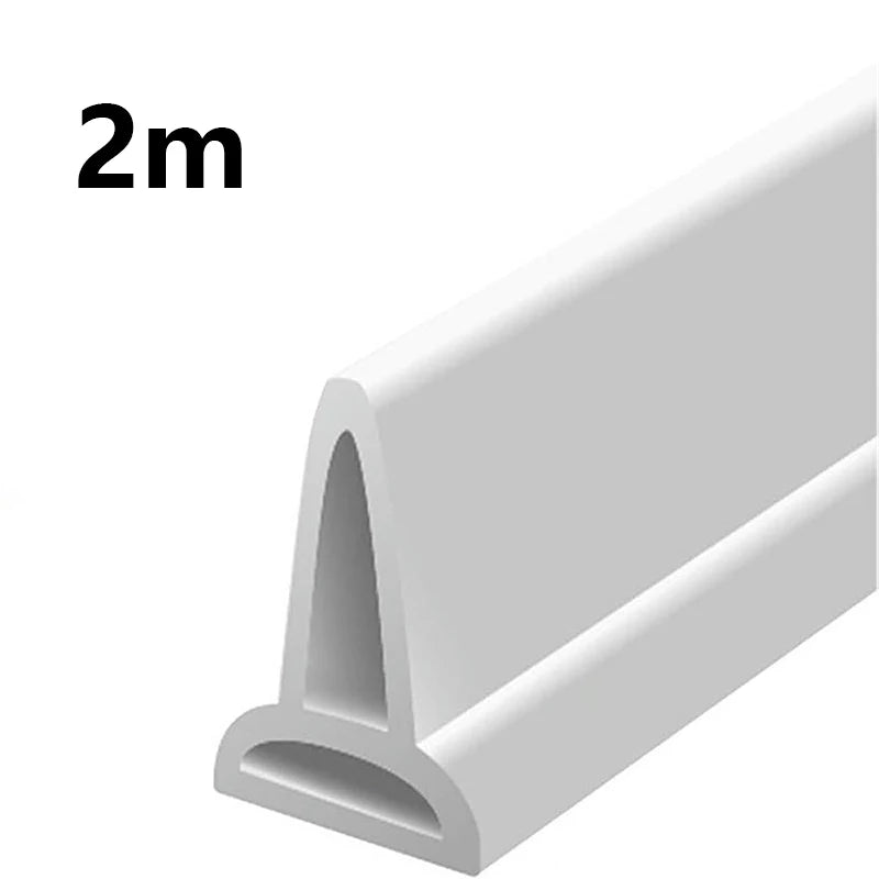 A white flexible shower water dam barrier, 2 meters long.