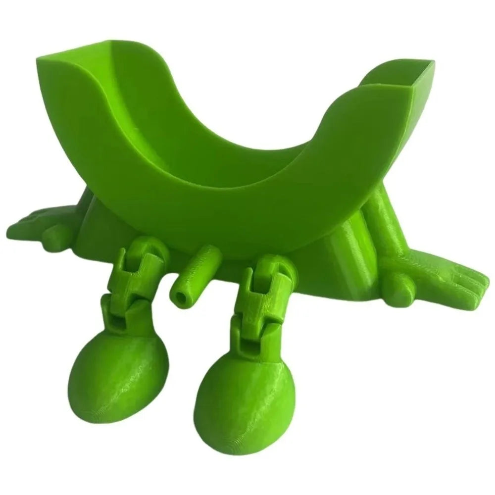 A bright green 3D sponge holder with a hanging design for kitchen sink.