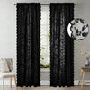 Black vintage floral lace sheer curtains in two panels hanging in a window.