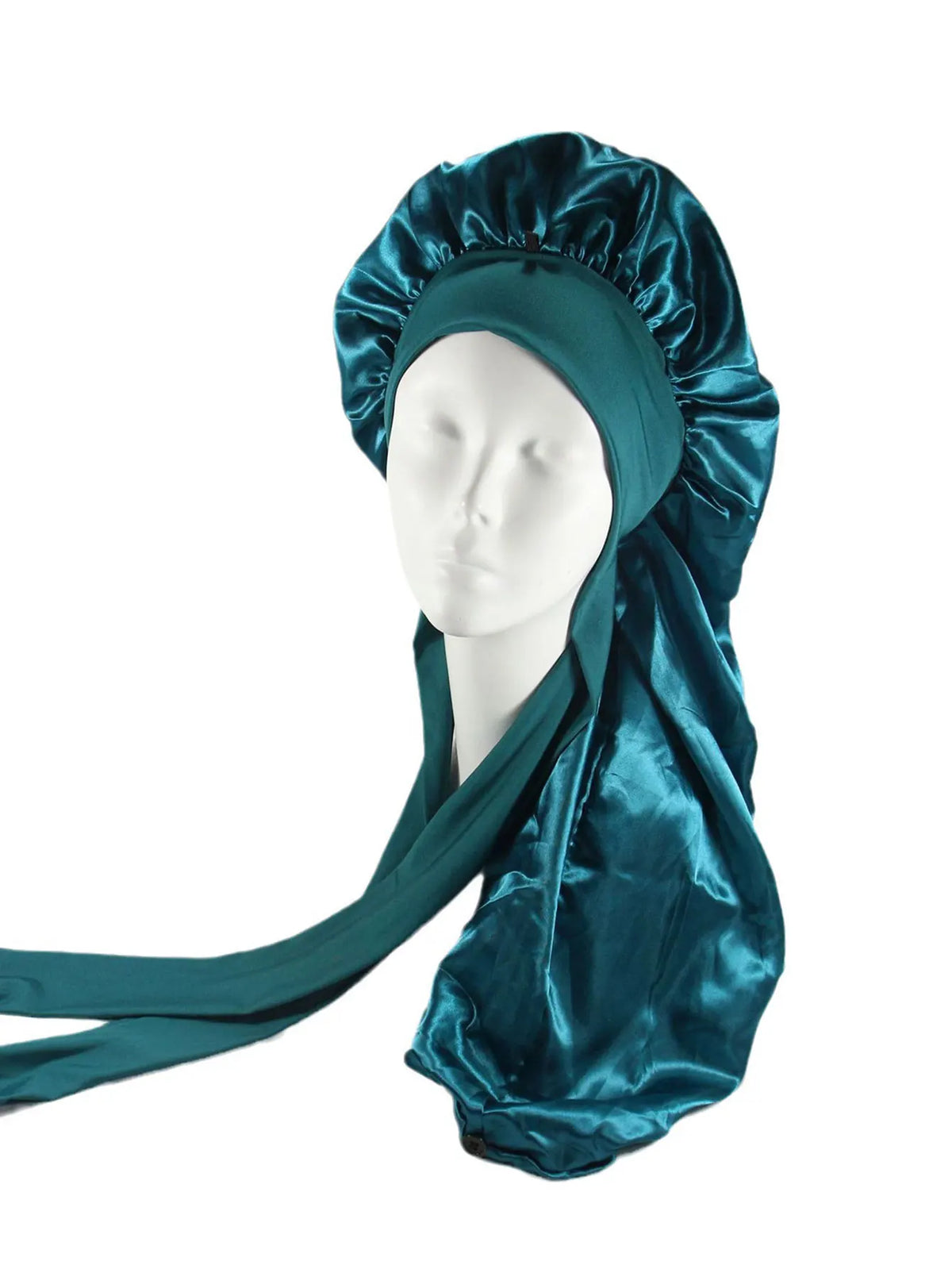A teal satin sleep bonnet draped over a white mannequin head.