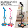 A portable karaoke microphone with a stand featuring light effects, shown in various colors.