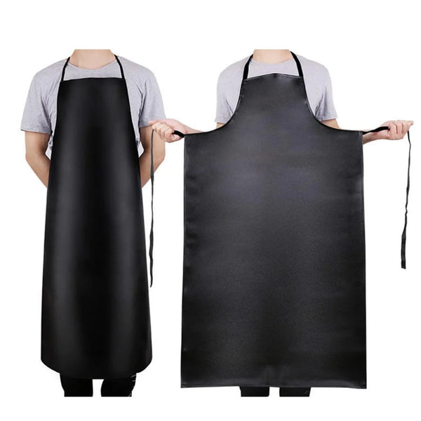 A black PU leather waterproof apron shown being worn by a person.