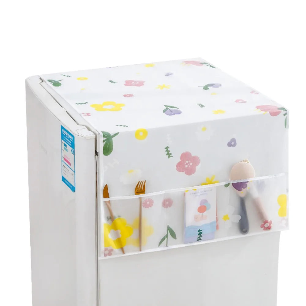 White refrigerator dust cover with storage pockets featuring a floral pattern.