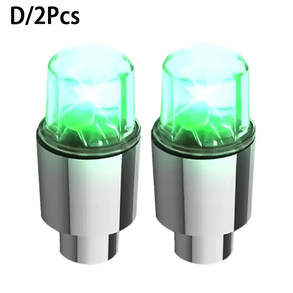 Two motion-activated LED tire valve lights for bikes, cars, and motorcycles.