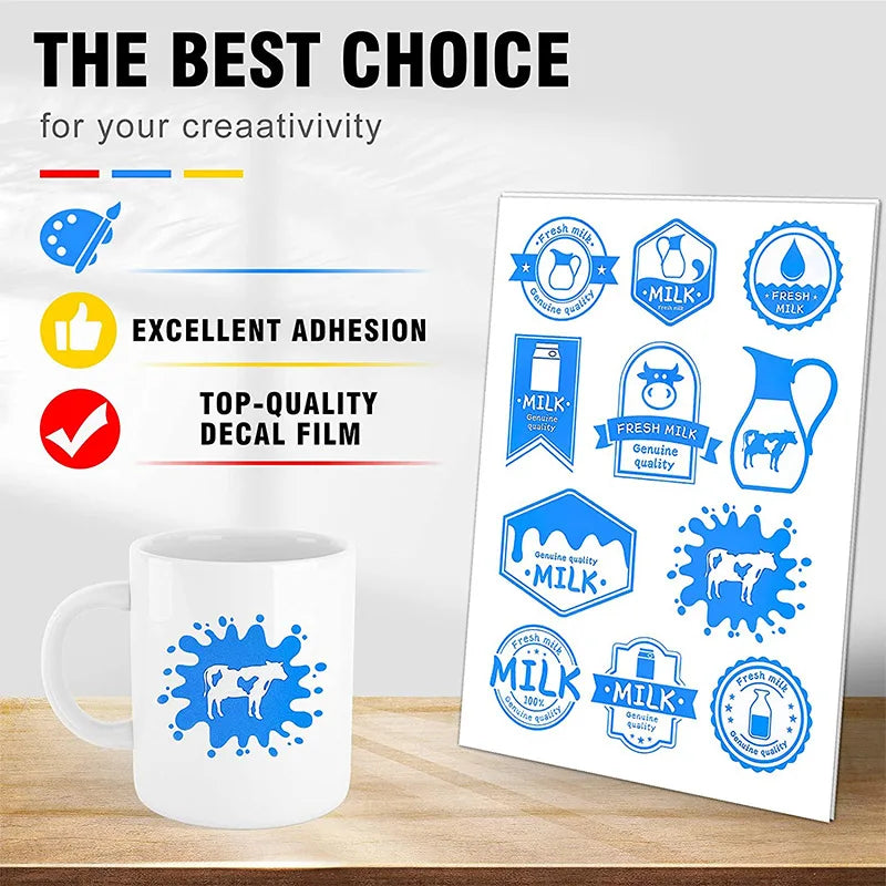 A white mug and a sheet of blue decal film featuring various milk-themed designs for creativity.