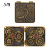 A set of five metal dice and a sixth die are shown in a rectangular box with a gold finish.
