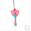 A pink dagger key necklace with a silver charm hanging from a chain.