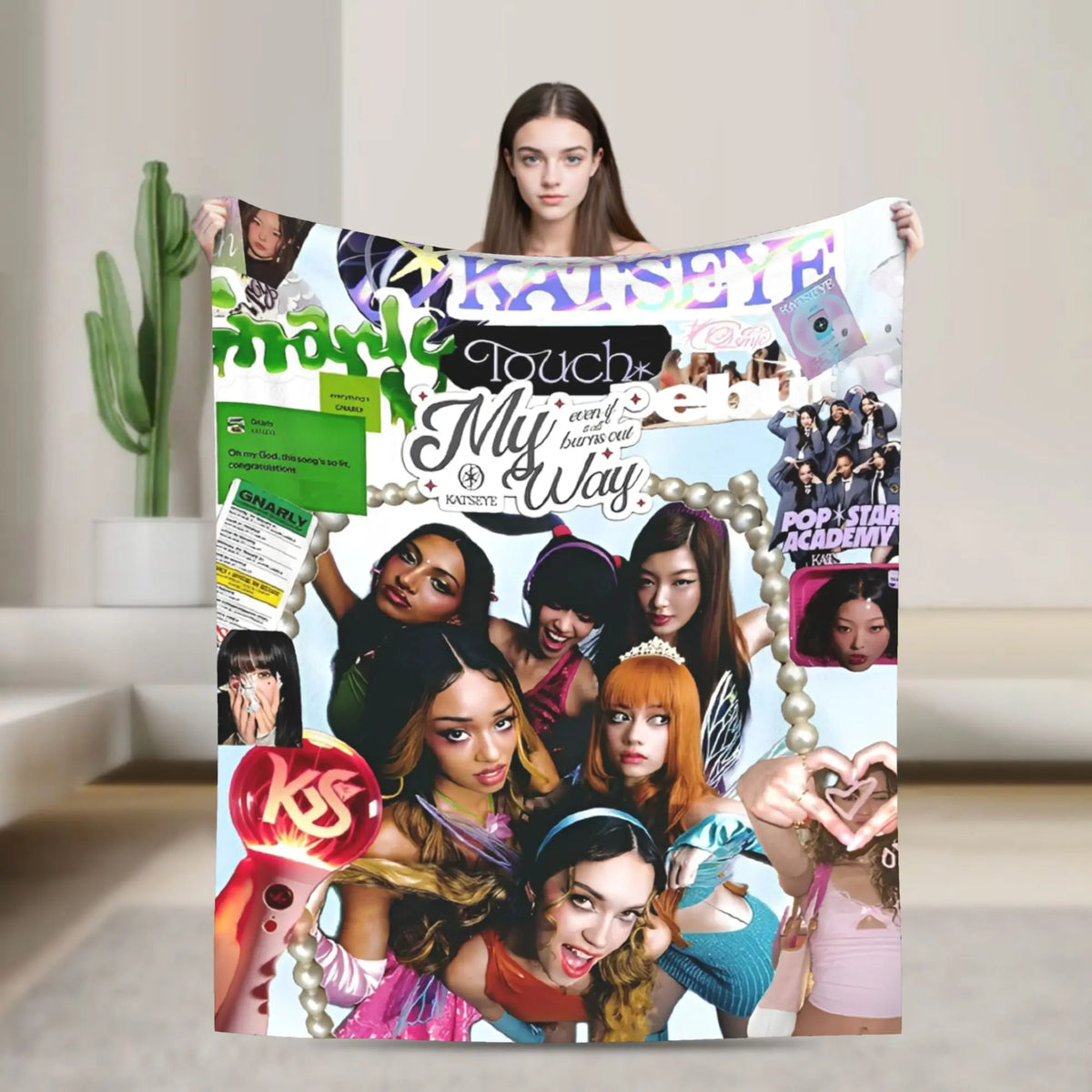 A colorful throw blanket featuring various models and text related to Katyeye and My Way