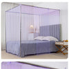 A princess-style lace canopy mosquito net draped over a bed, creating a sheer purple enclosure.