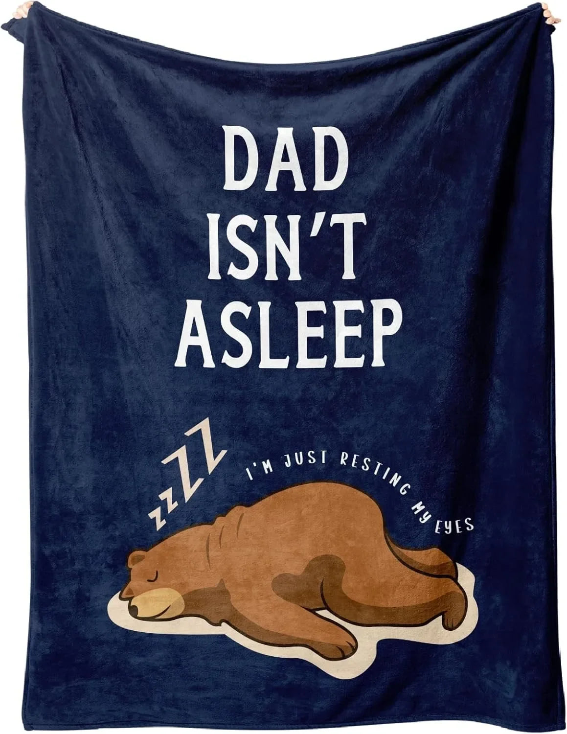 Dark blue fleece throw blanket featuring white text that reads Dad isn't asleep andzzz resting my eyes with a sleeping bear.