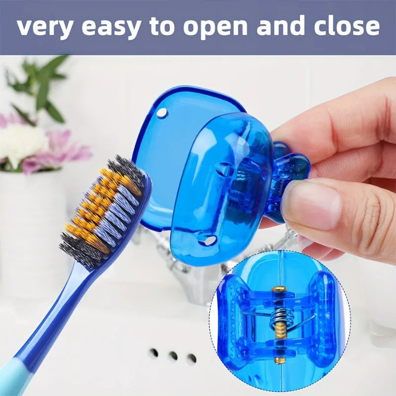 A hand holds a blue silicone toothbrush head cover with a clip, showing the easy open and close mechanism.
