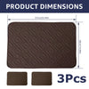 Three brown quilted headrest protector covers with dimensions 57cm by 38cm