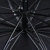 Close-up view of a black foldable windshield sunshade with a spoked design.