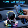 A hand places an iPhone on an auto-clamping wireless car phone holder with RGB ambient light in a car interior.