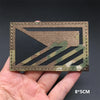 A rectangular tactical patch featuring a camouflage pattern with a triangular design and hook-and-loop backing.