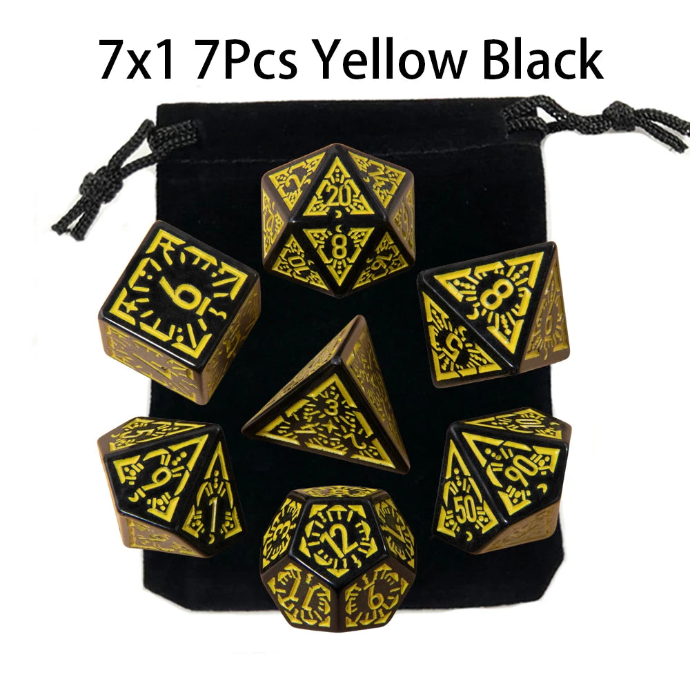 A set of seven yellow and black polyhedral dice packaged in a black pouch.