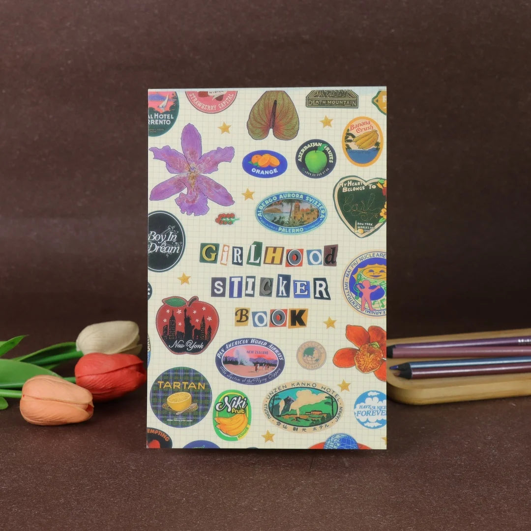 A colorful sticker book featuring various fruit, nature, and themed illustrations for scrapbooking.