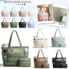 A variety of multi-color quilted puffy tote bags in various shades of green, pink, and gray.