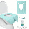 A package of disposable toilet seat covers in light teal color shown next to a white toilet.