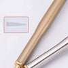 Close-up view of a gold-colored adjustable foam spray gun with a clear tip and metal fitting.