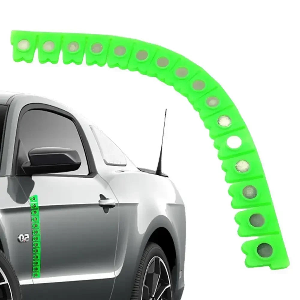 A bright green magnetic dry grinding protective strip is shown curved over a silver car body.