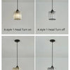 A crystal pendant light fixture shown in two styles, demonstrating the on and off switch functionality.