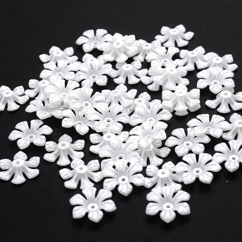 A pile of 100 white acrylic pearl spacer beads for jewelry making