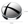 A round, silver blind spot mirror with a black 'X' design and dimensions shown.