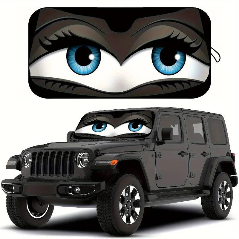 A black Jeep Wrangler is shown with a cartoon owl face sunshade installed on the windshield.