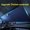 A close-up view of a car interior showing an upgraded thick sunshade installed on the windshield.