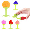 A set of silicone baby teethers in orange, purple, and red shapes for soothing and fun teething.